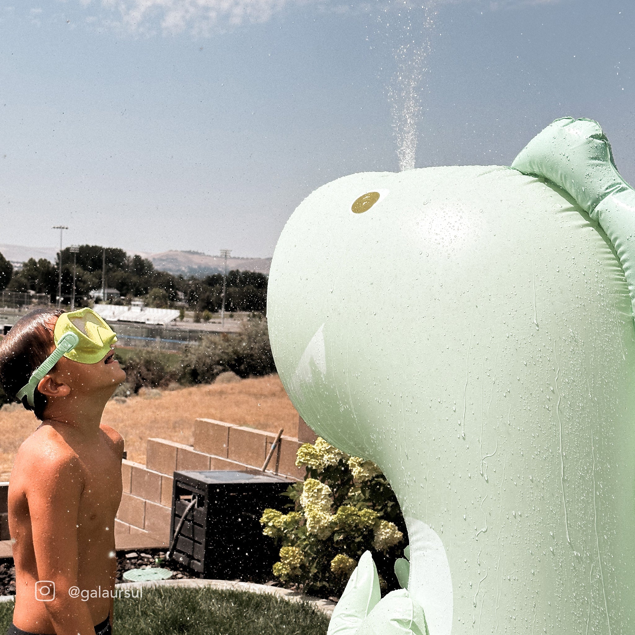 Inflatable Giant Surfing Dino Sprinkler